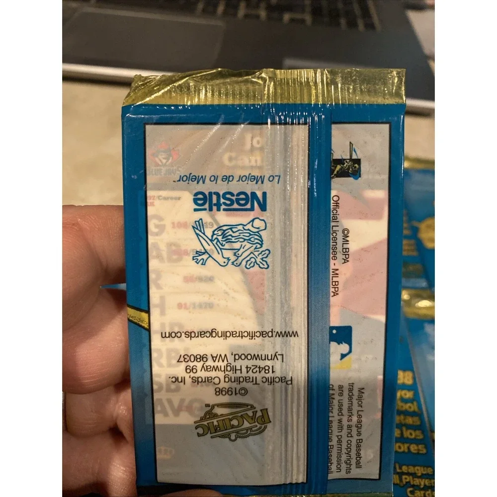 1998 Pacific Nestle Unopened Packs (7). HOF Visible On Back P. Martinez & Others
